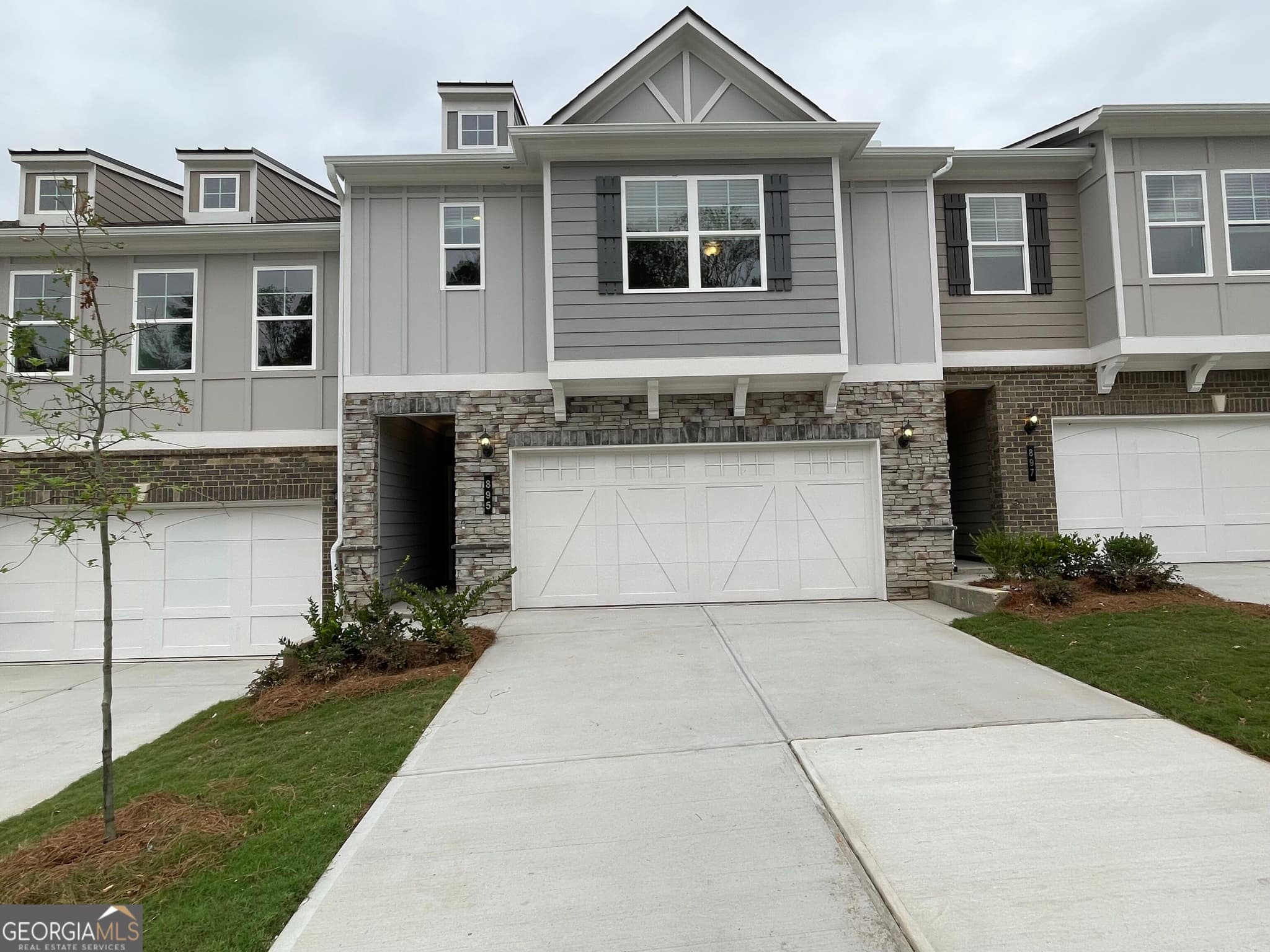 3 bedroom, 2.5 bathroom, 1,912 sq ft townhouse for sale at 885 Counterpoint Drive LOT 12, Decatur, GA 30032 — photo 1 of 27