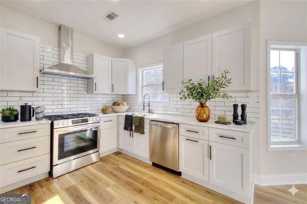 4 bedroom, 2.5 bathroom, 2,331 sq ft single family residence for sale at 165 Morton Walk Drive, Johns Creek, GA 30022 — photo 7
