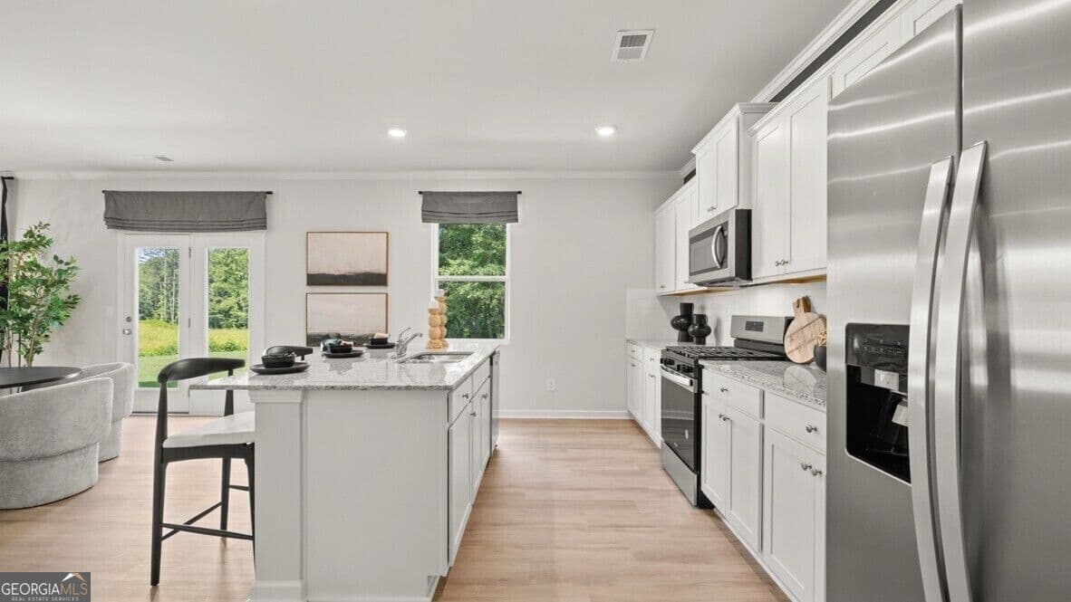 4 bedroom, 3.5 bathroom, 2,890 sq ft single family residence for sale at 2909 Ariel Court, Lithia Springs, GA 30122 — photo 6