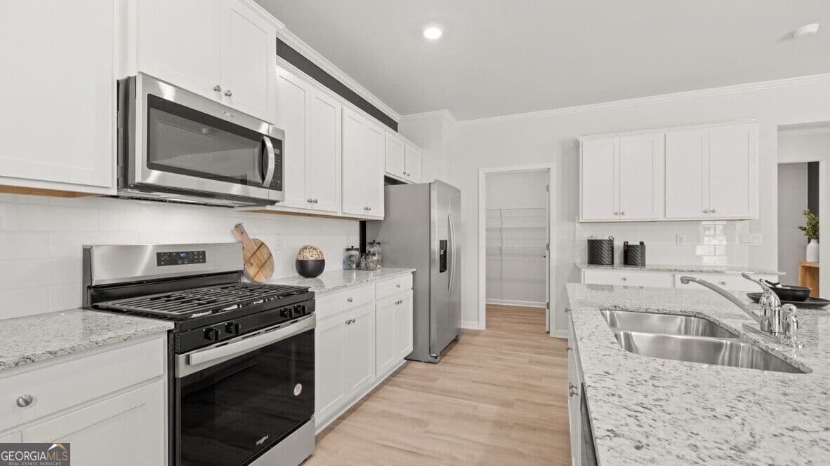 4 bedroom, 3.5 bathroom, 2,890 sq ft single family residence for sale at 2909 Ariel Court, Lithia Springs, GA 30122 — photo 7