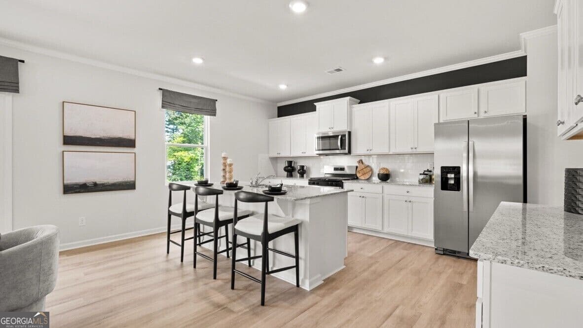 4 bedroom, 3.5 bathroom, 2,890 sq ft single family residence for sale at 2909 Ariel Court, Lithia Springs, GA 30122 — photo 5