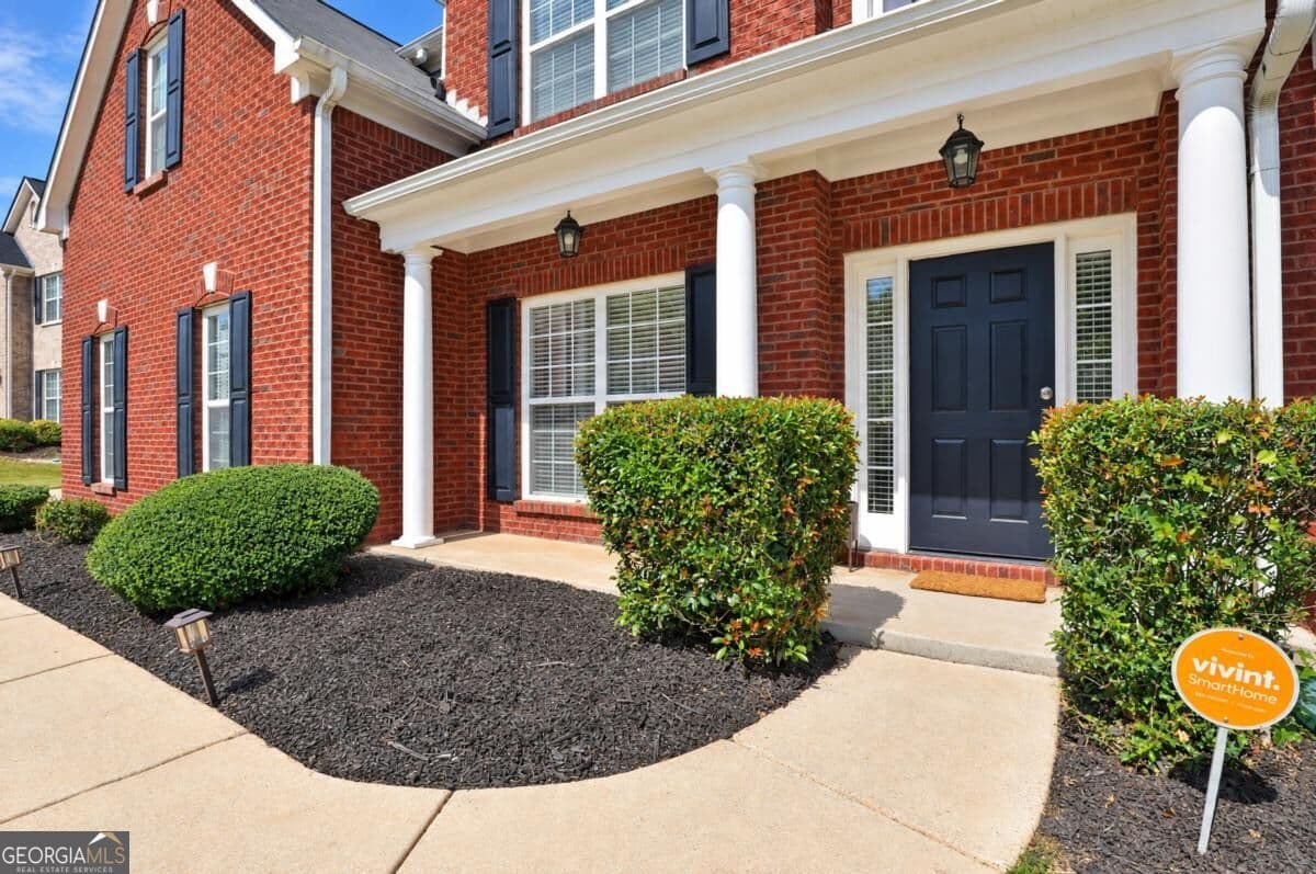 5 bedroom, 4 bathroom, 3,661 sq ft single family residence for sale at 1324 Darian Lane, Locust Grove, GA 30248 — photo 3