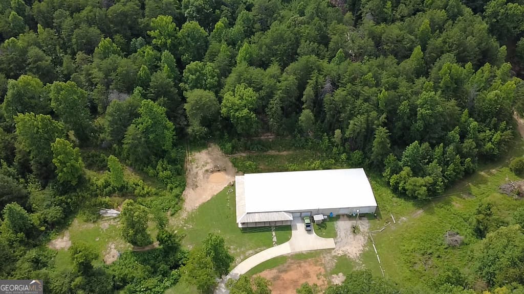 6 bedroom, 4 bathroom, 3,875 sq ft single family residence for sale at 1576 Dripping Springs Road, Lafayette, GA 30728 — photo 2
