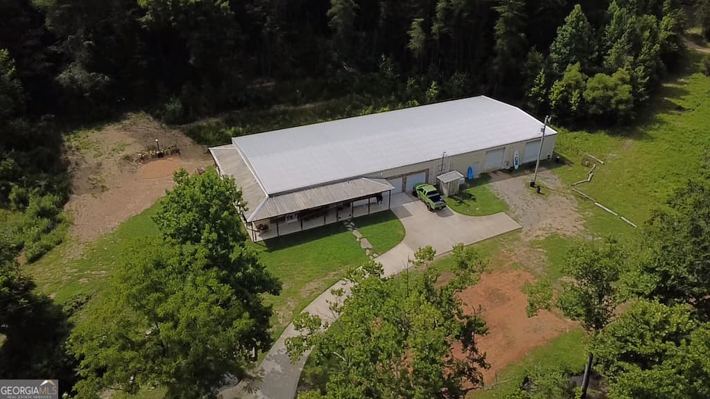 6 bedroom, 4 bathroom, 3,875 sq ft single family residence for sale at 1576 Dripping Springs Road, Lafayette, GA 30728