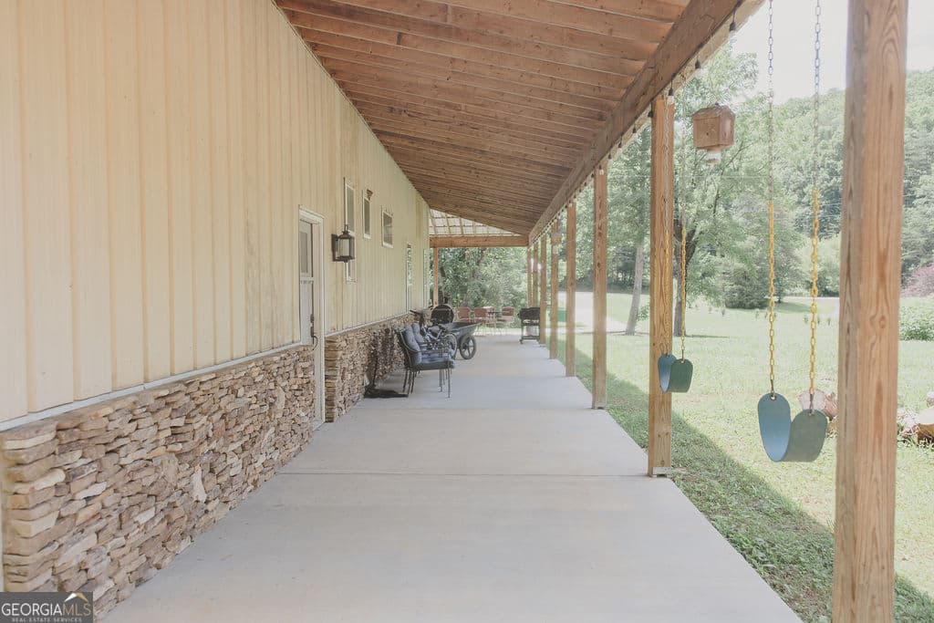 6 bedroom, 4 bathroom, 3,875 sq ft single family residence for sale at 1576 Dripping Springs Road, Lafayette, GA 30728 — photo 10