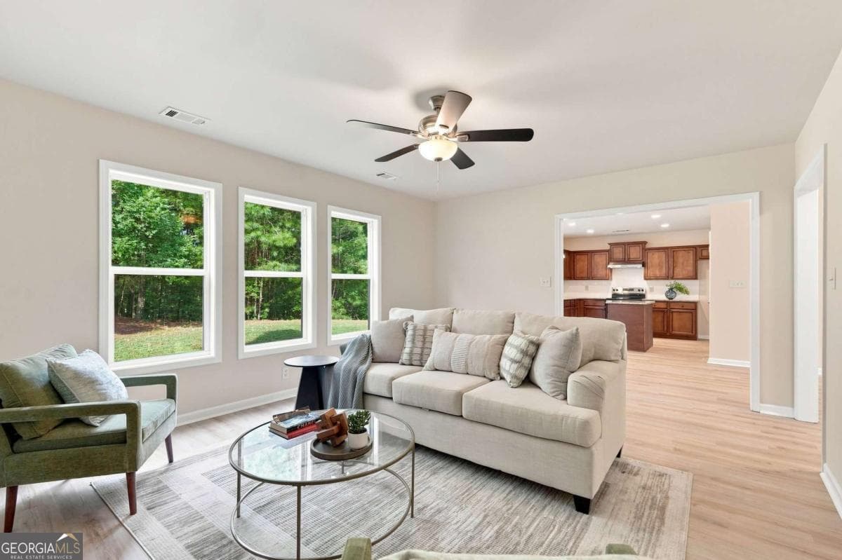 4 bedroom, 2.5 bathroom single family residence for sale at 4128 Brynhill Lane, Buford, GA 30518 — photo 6