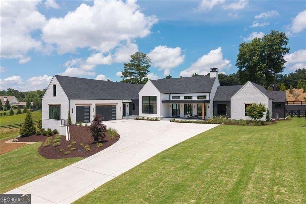 5 bedroom, 6.5 bathroom, 6,545 sq ft single family residence for sale at 1350 A J Land Road, Canton, GA 30115 — photo 1 of 54