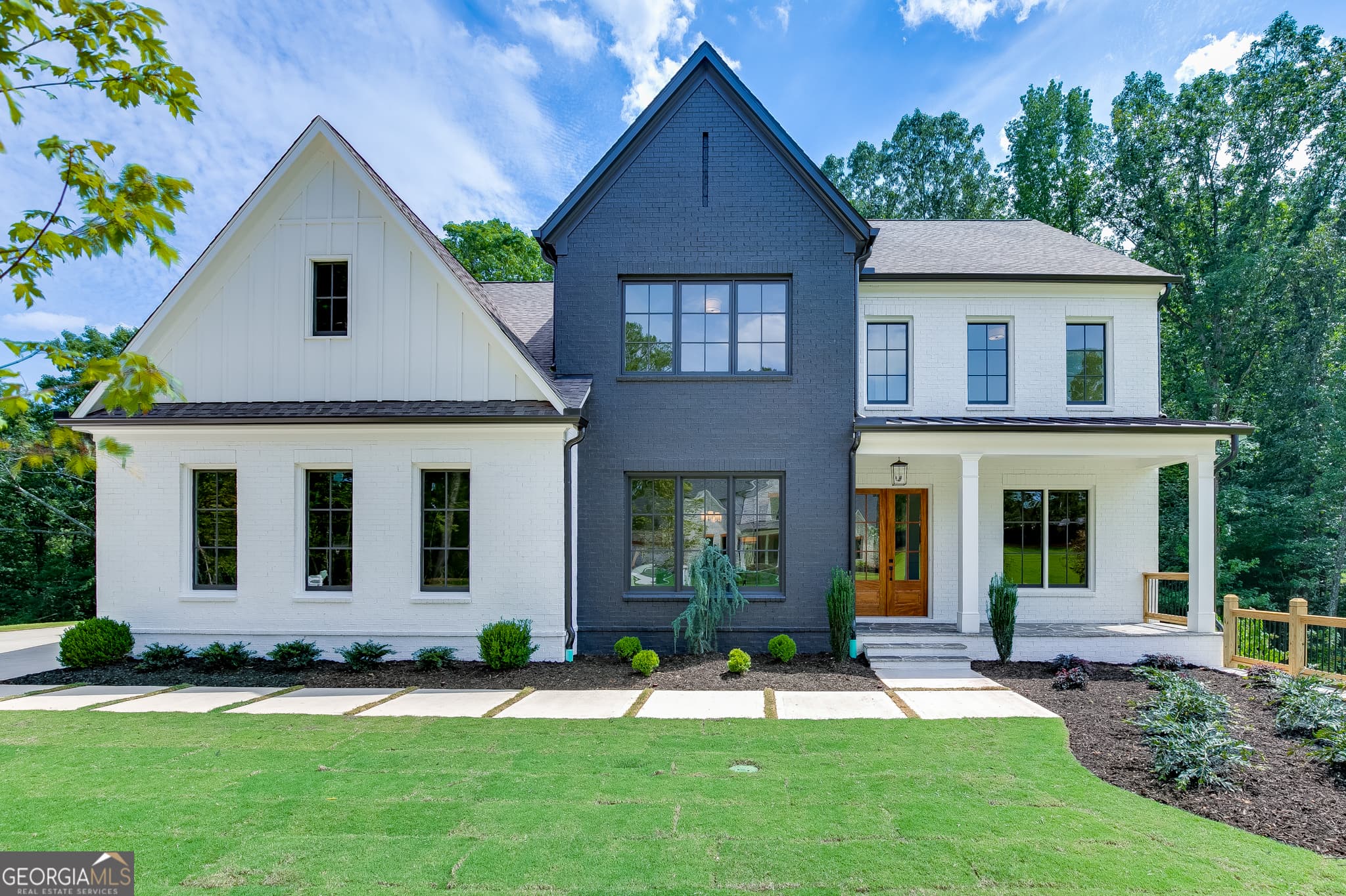 4 bedroom, 3.5 bathroom, 3,976 sq ft single family residence for sale at 2975 N Bogan Road 4, Buford, GA 30519 — photo 2