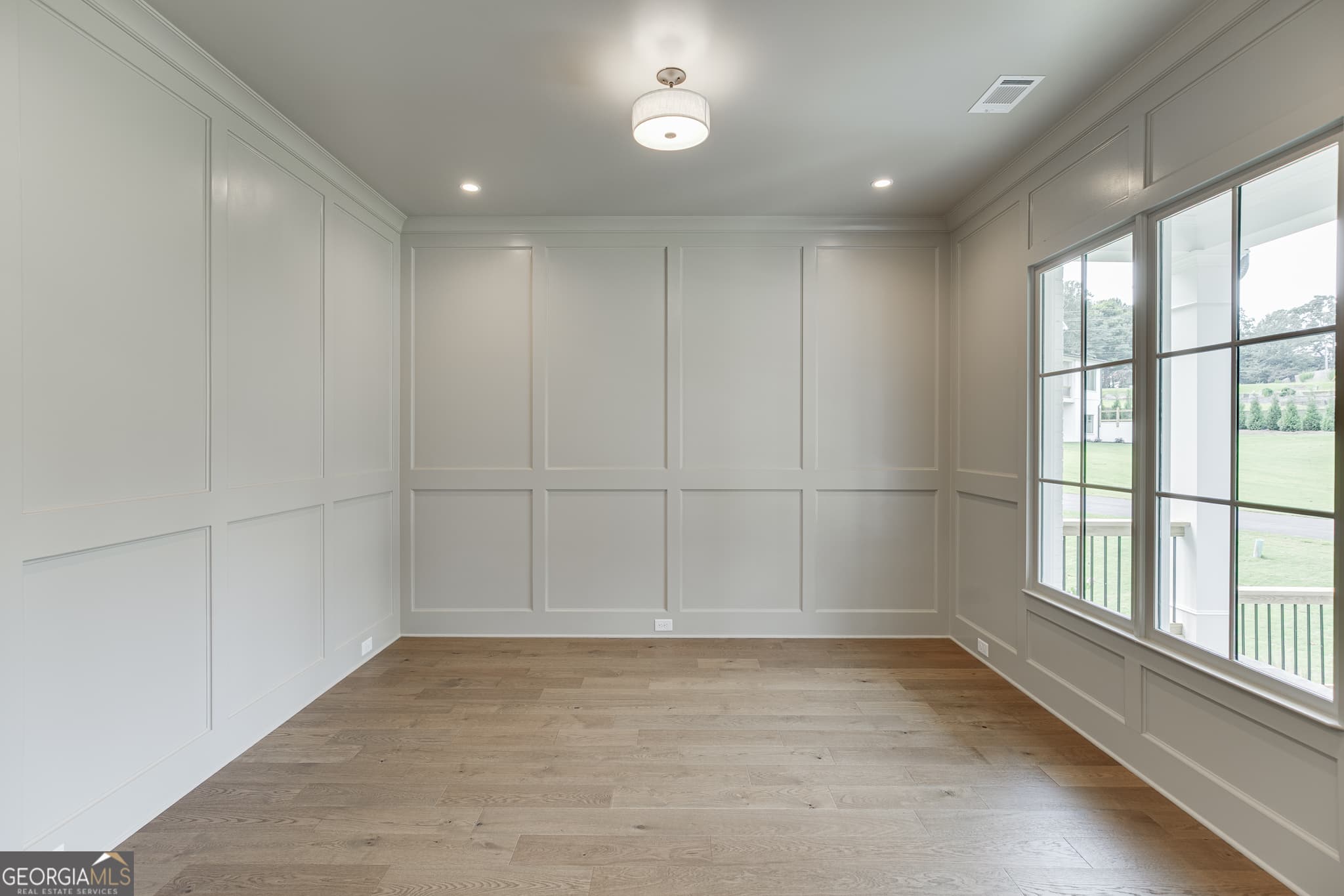 4 bedroom, 3.5 bathroom, 3,976 sq ft single family residence for sale at 2975 N Bogan Road 4, Buford, GA 30519 — photo 7