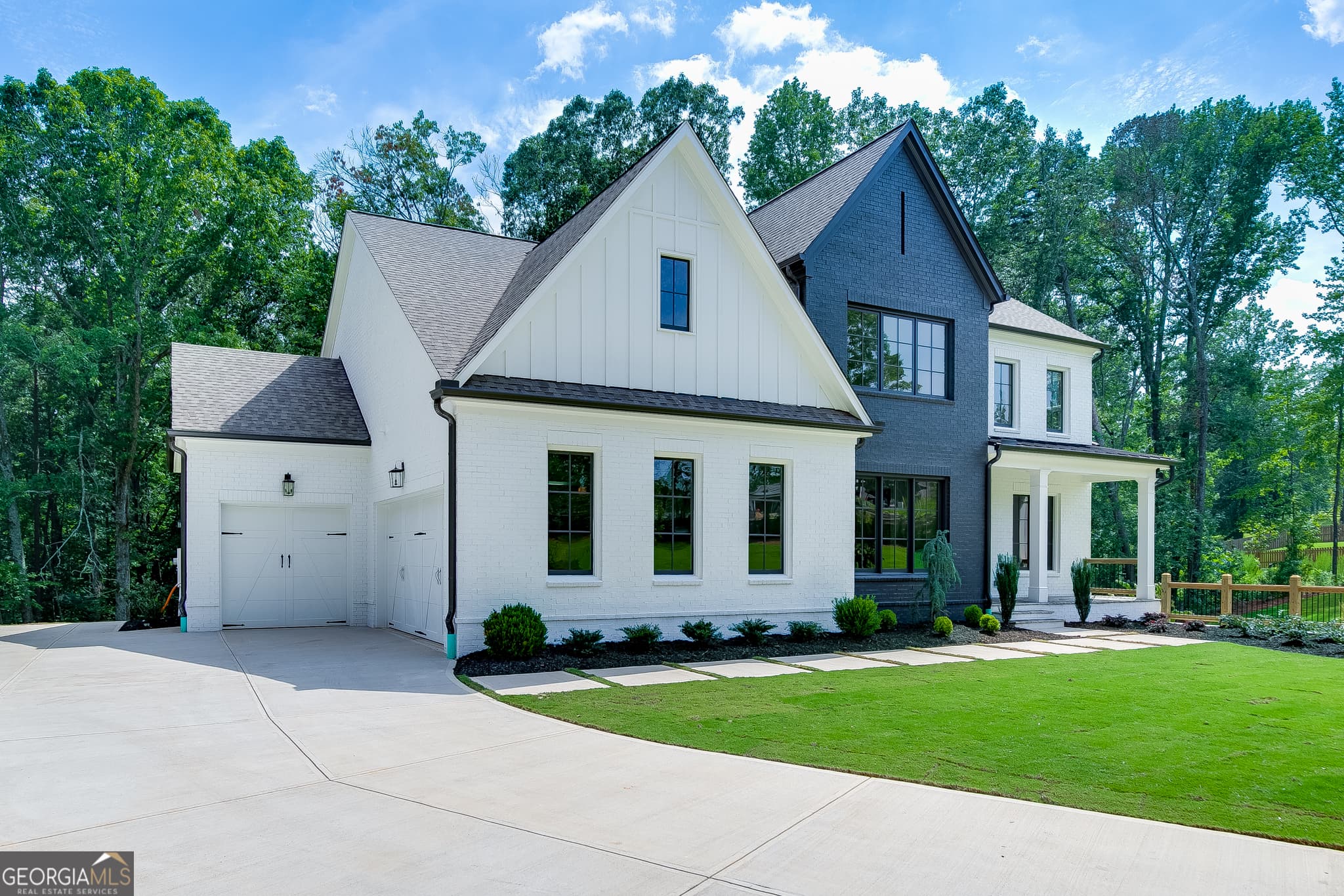 4 bedroom, 3.5 bathroom, 3,976 sq ft single family residence for sale at 2975 N Bogan Road 4, Buford, GA 30519 — photo 3