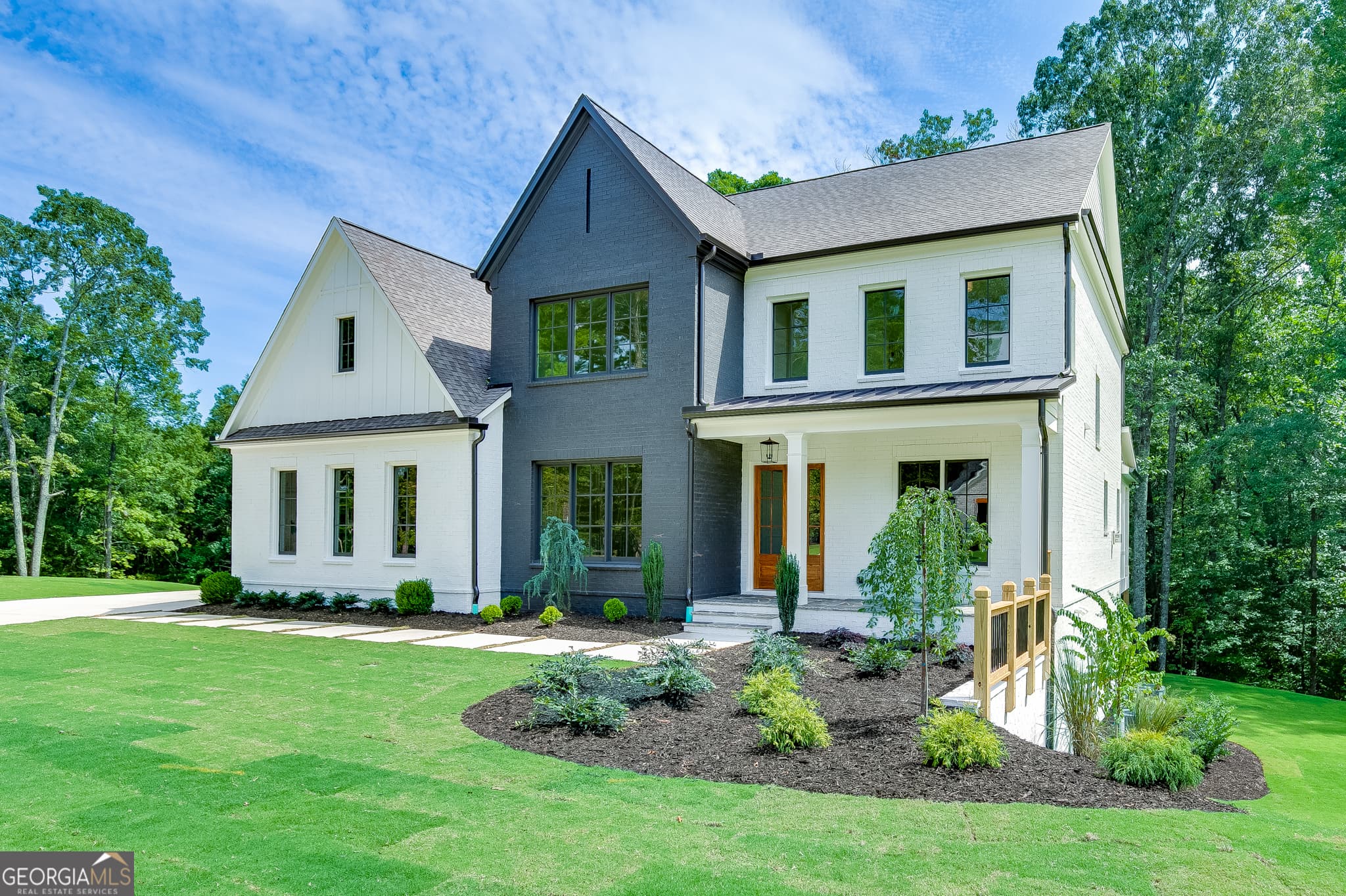 4 bedroom, 3.5 bathroom, 3,976 sq ft single family residence for sale at 2975 N Bogan Road 4, Buford, GA 30519 — photo 5