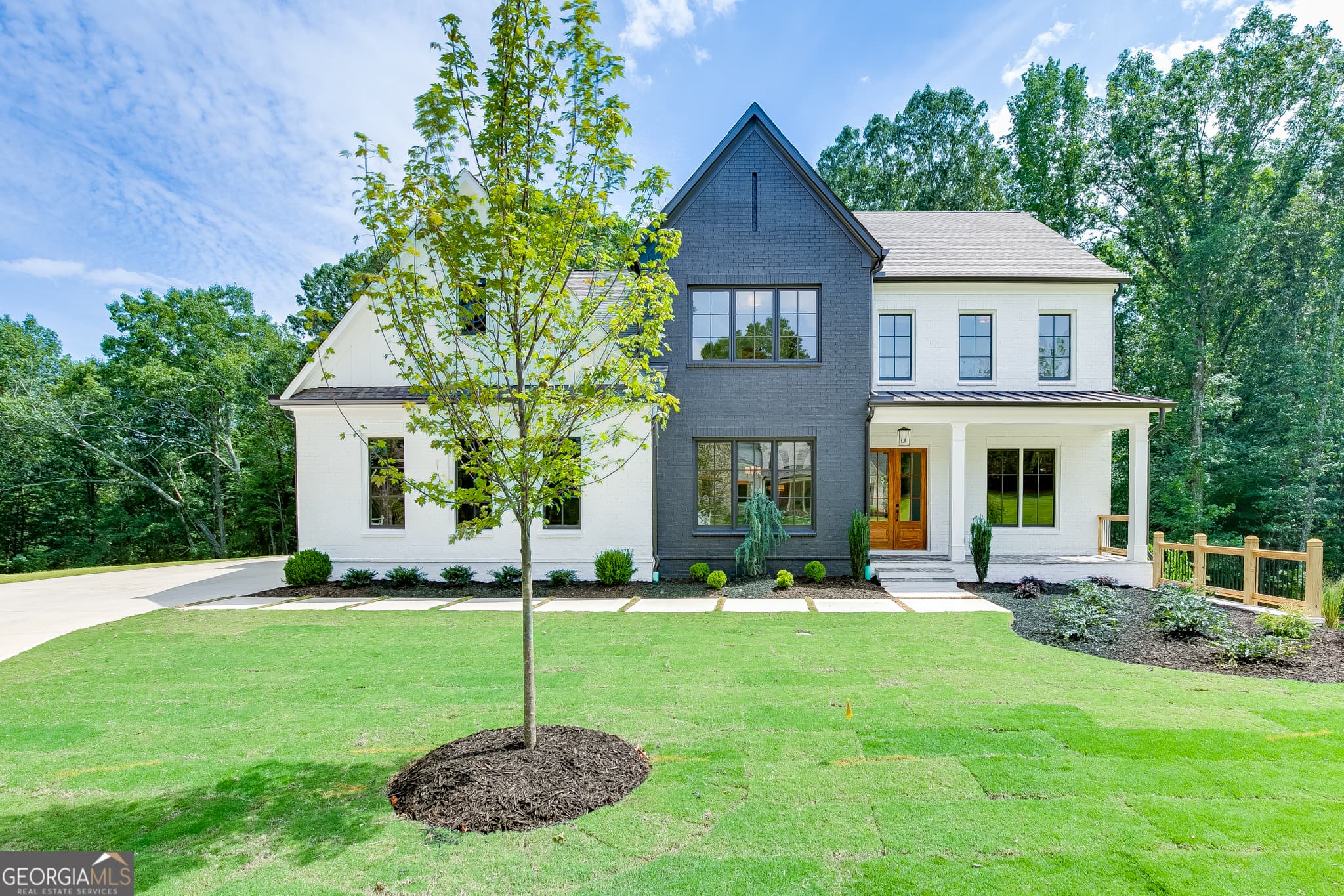 4 bedroom, 3.5 bathroom, 3,976 sq ft single family residence for sale at 2975 N Bogan Road 4, Buford, GA 30519 — photo 4