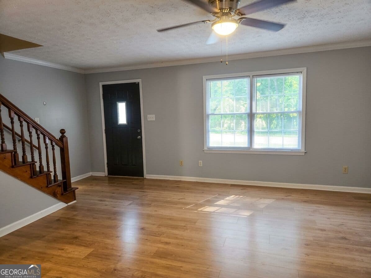 2 bedroom, 2.5 bathroom, 1,307 sq ft townhouse for sale at 2140 Kings Gate Circle # B, Snellville, GA 30078 — photo 2