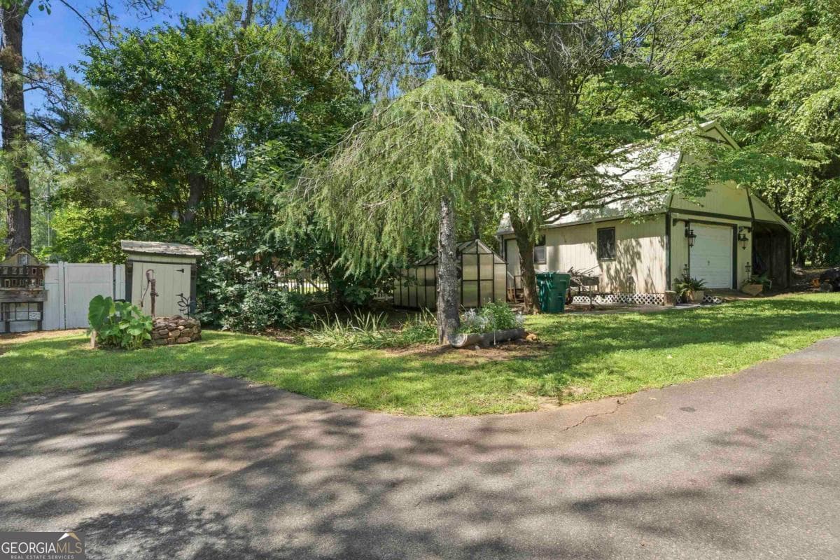 3 bedroom, 2 bathroom, 2,228 sq ft single family residence for sale at 240 Quesenberry Drive, Eatonton, GA 31024 — photo 2
