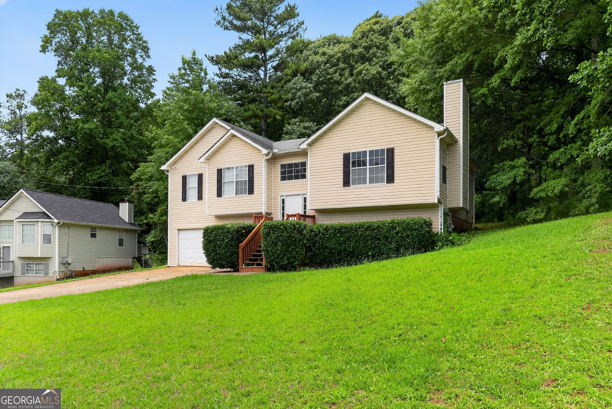 3 bedroom, 2 bathroom, 2,160 sq ft single family residence for sale at 7830 Poppy Drive, Winston, GA 30187 — photo 1 of 27