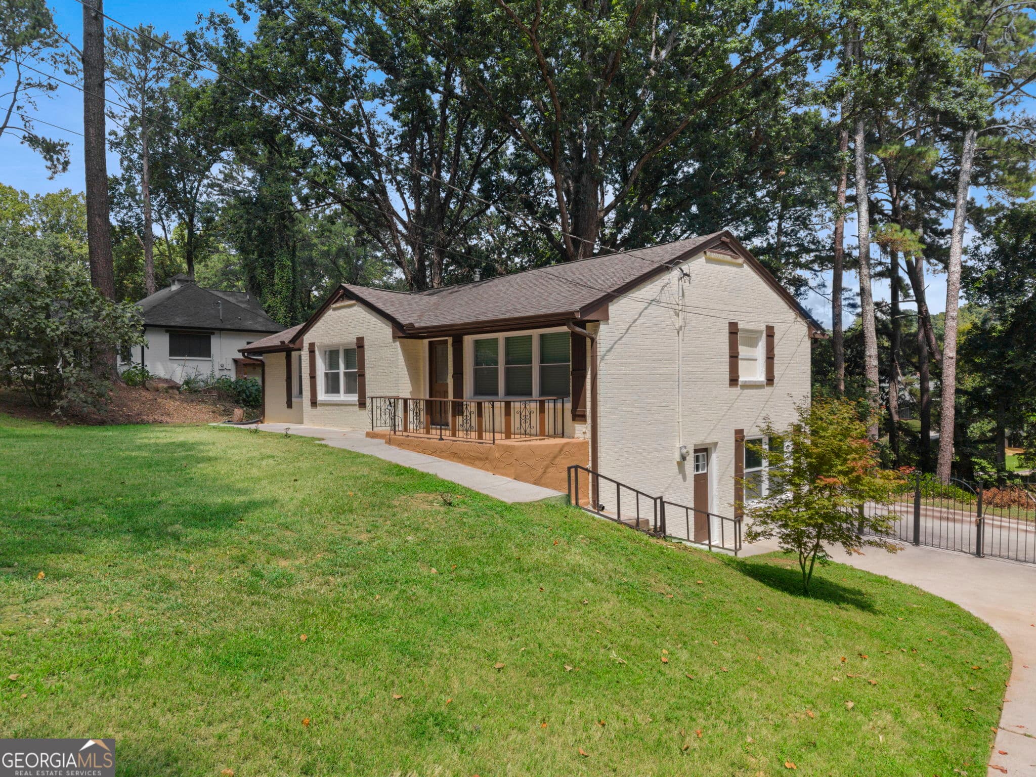 4 bedroom, 3 bathroom, 2,632 sq ft single family residence for sale at 2783 Ben Hill Road, East Point, GA 30344 — photo 2