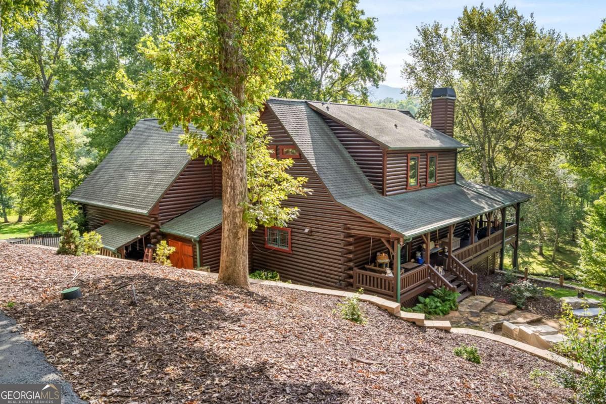 4 bedroom, 3.5 bathroom single family residence for sale at 3383 Indian Springs Drive, Hiawassee, GA 30546 — photo 2