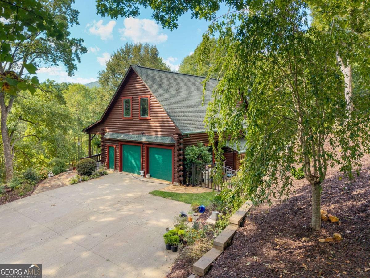 4 bedroom, 3.5 bathroom single family residence for sale at 3383 Indian Springs Drive, Hiawassee, GA 30546 — photo 3