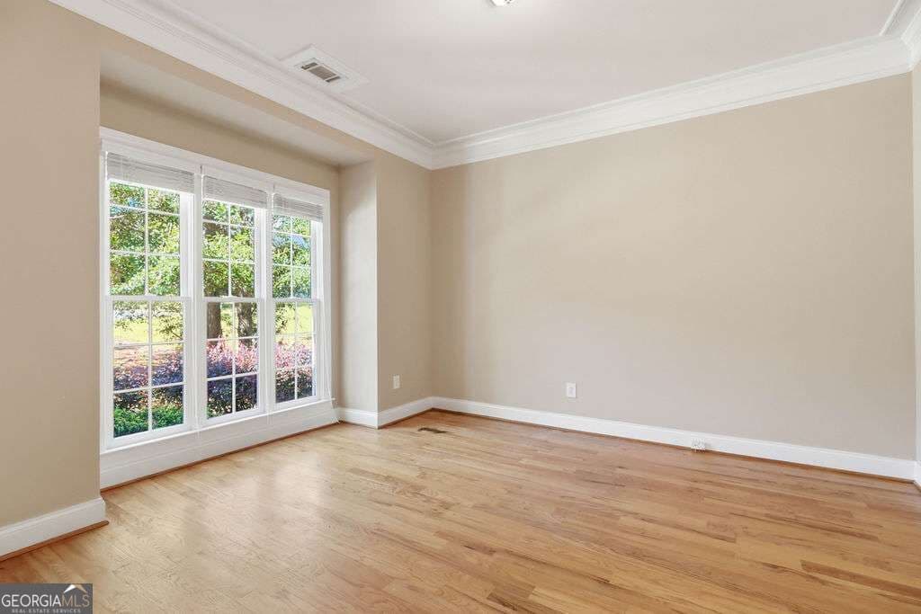5 bedroom, 4.5 bathroom, 5,131 sq ft single family residence for sale at 1040 Pin Oak Court, Bishop, GA 30621 — photo 6