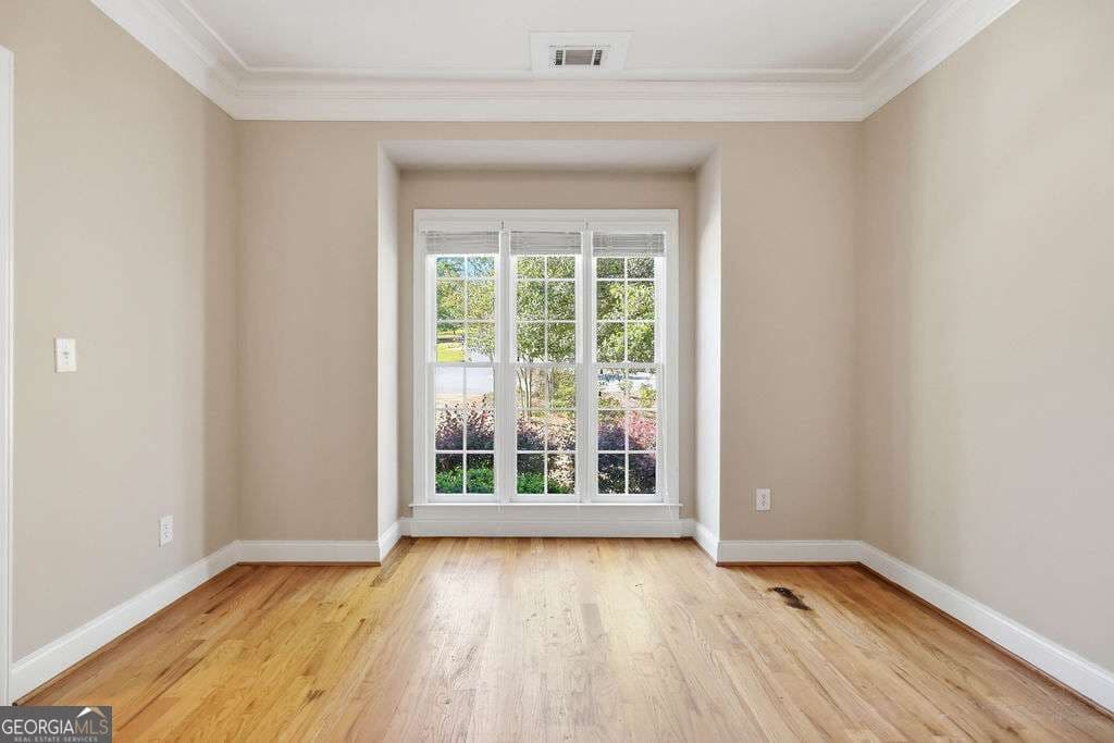 5 bedroom, 4.5 bathroom, 5,131 sq ft single family residence for sale at 1040 Pin Oak Court, Bishop, GA 30621 — photo 7