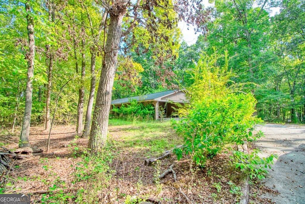3 bedroom, 2 bathroom, 1,739 sq ft single family residence for sale at 1847 W Hightower Trial, Conyers, GA 30012 — photo 6