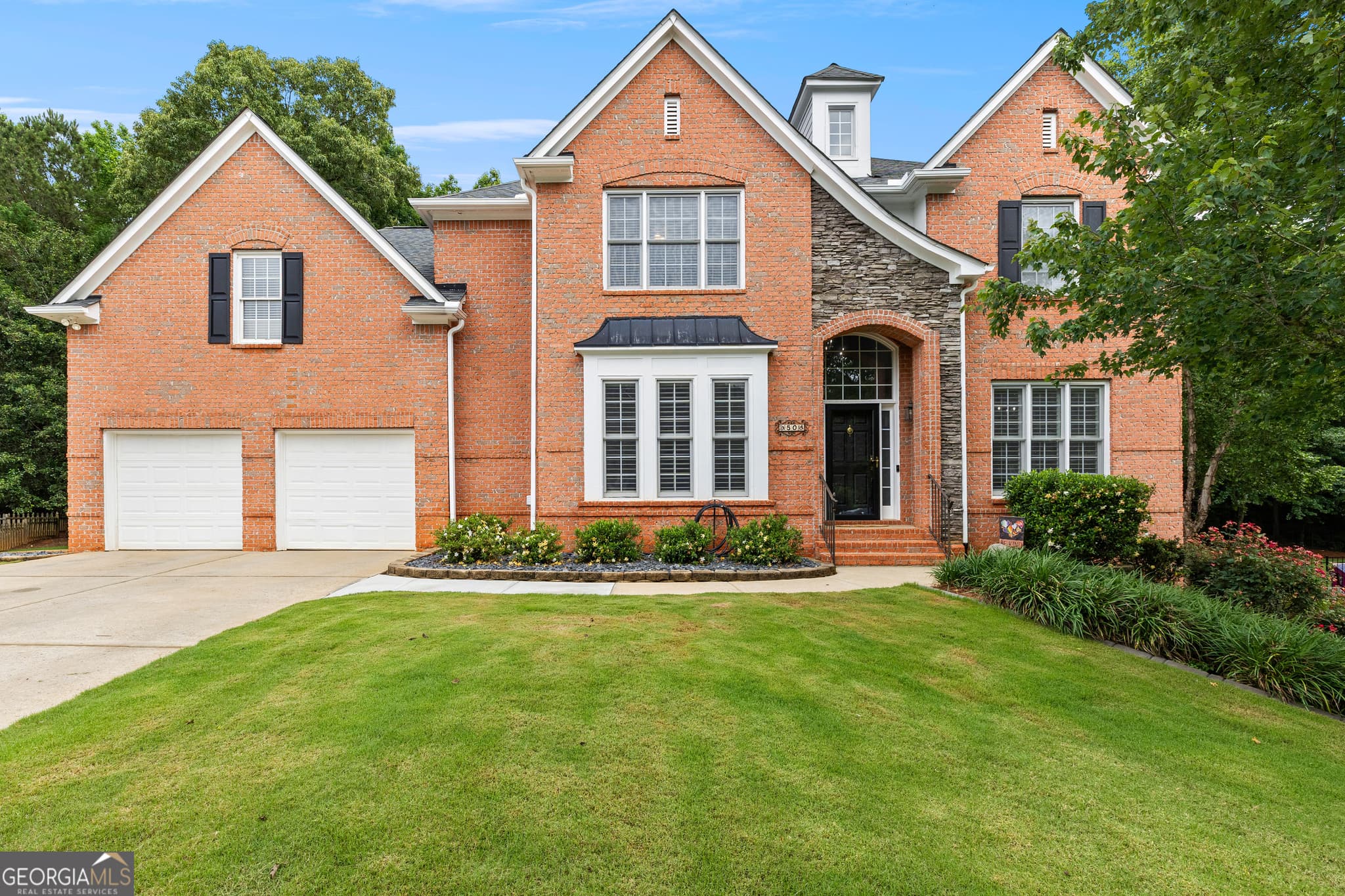5 bedroom, 3.5 bathroom, 4,008 sq ft single family residence sold at 50 Spring Mist Court, Newnan, GA 30265