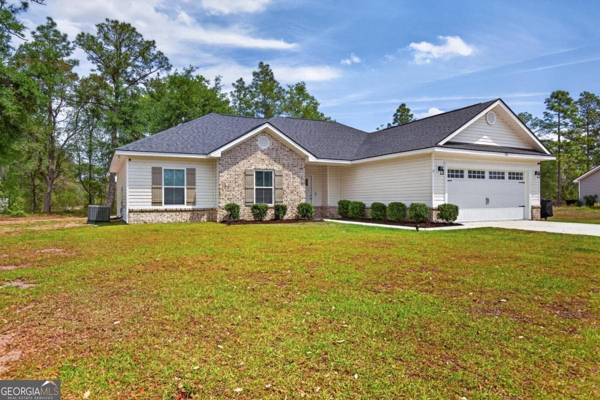 4 bedroom, 2 bathroom, 1,441 sq ft single family residence for sale at 73 Taylor Creek Spur, Ludowici, GA 31316 — photo 2
