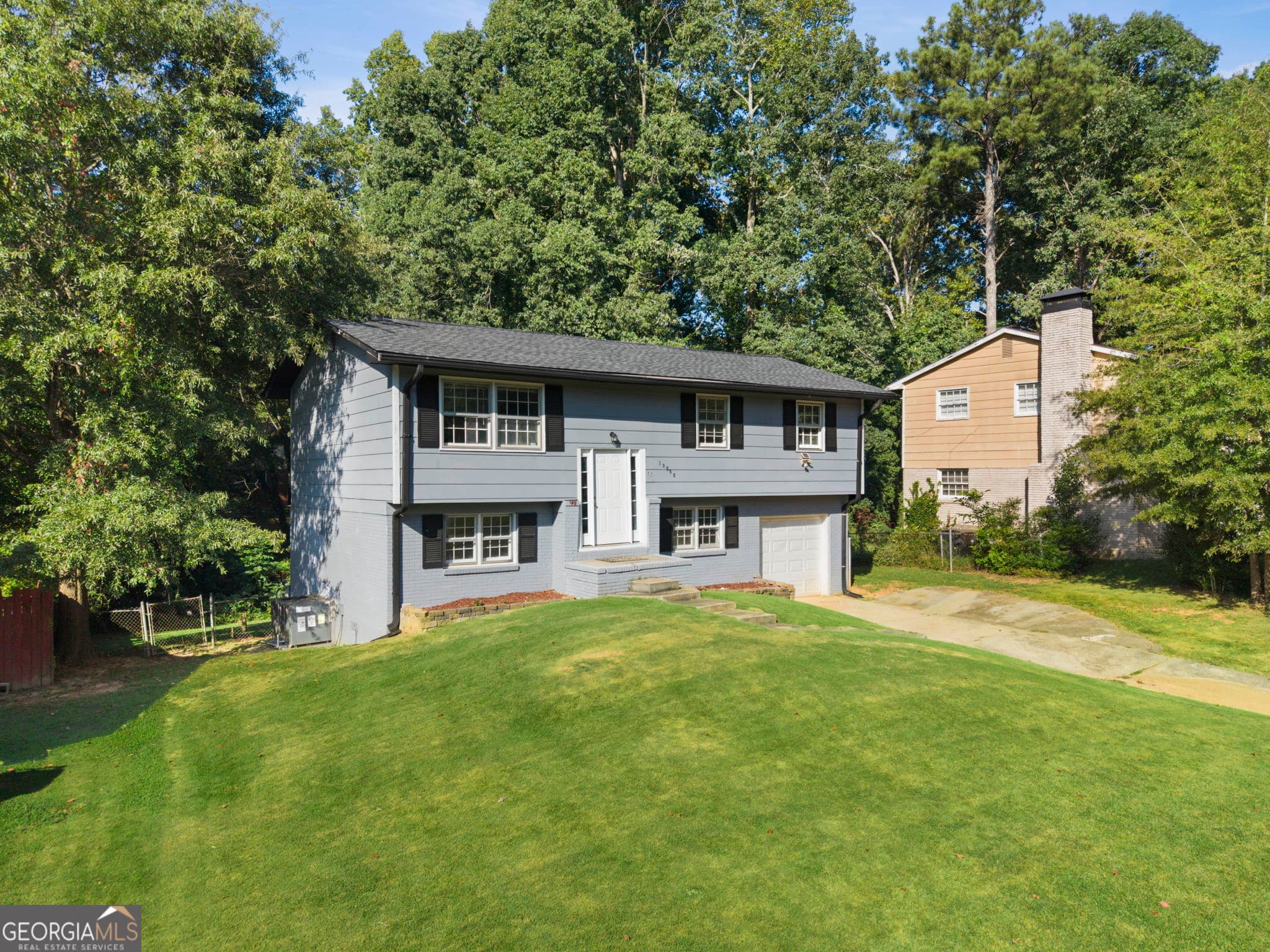5 bedroom, 2.5 bathroom, 1,608 sq ft single family residence for sale at 10555 Thrasher Road, Jonesboro, GA 30238 — photo 3