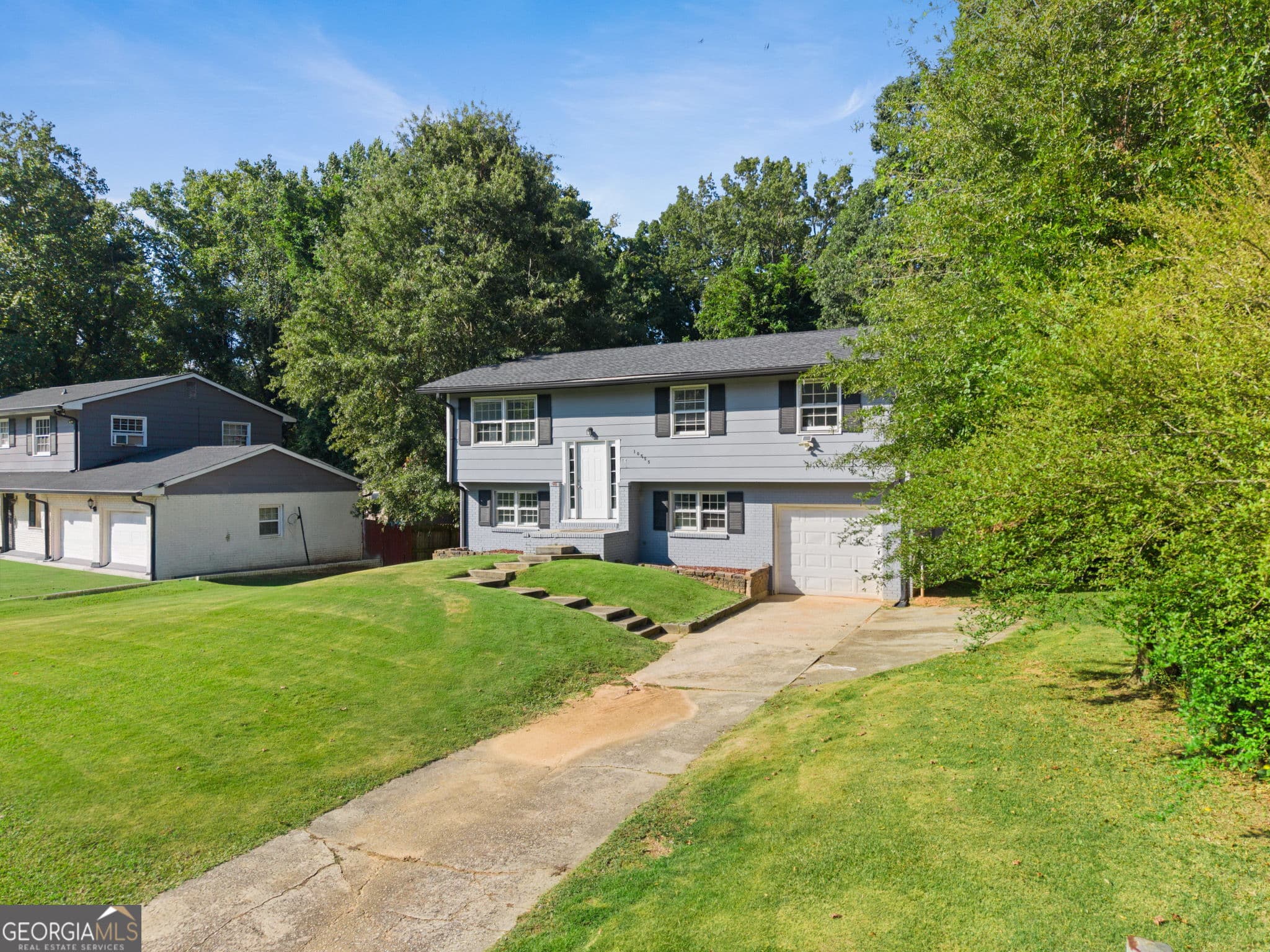 5 bedroom, 2.5 bathroom, 1,608 sq ft single family residence for sale at 10555 Thrasher Road, Jonesboro, GA 30238 — photo 4