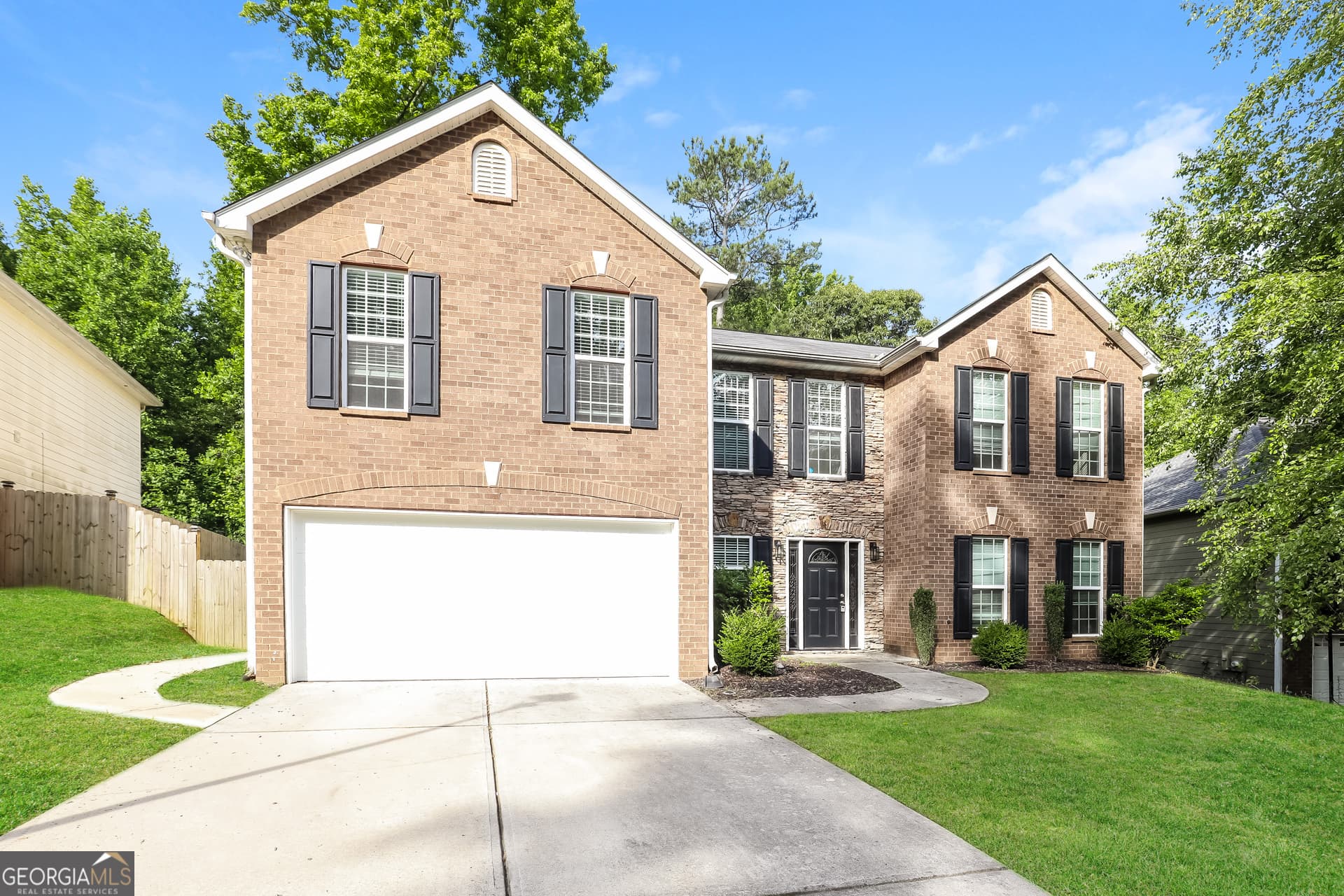 4 bedroom, 2.5 bathroom, 2,932 sq ft single family residence for sale at 7895 Waterwheel Way, Jonesboro, GA 30238 — photo 2