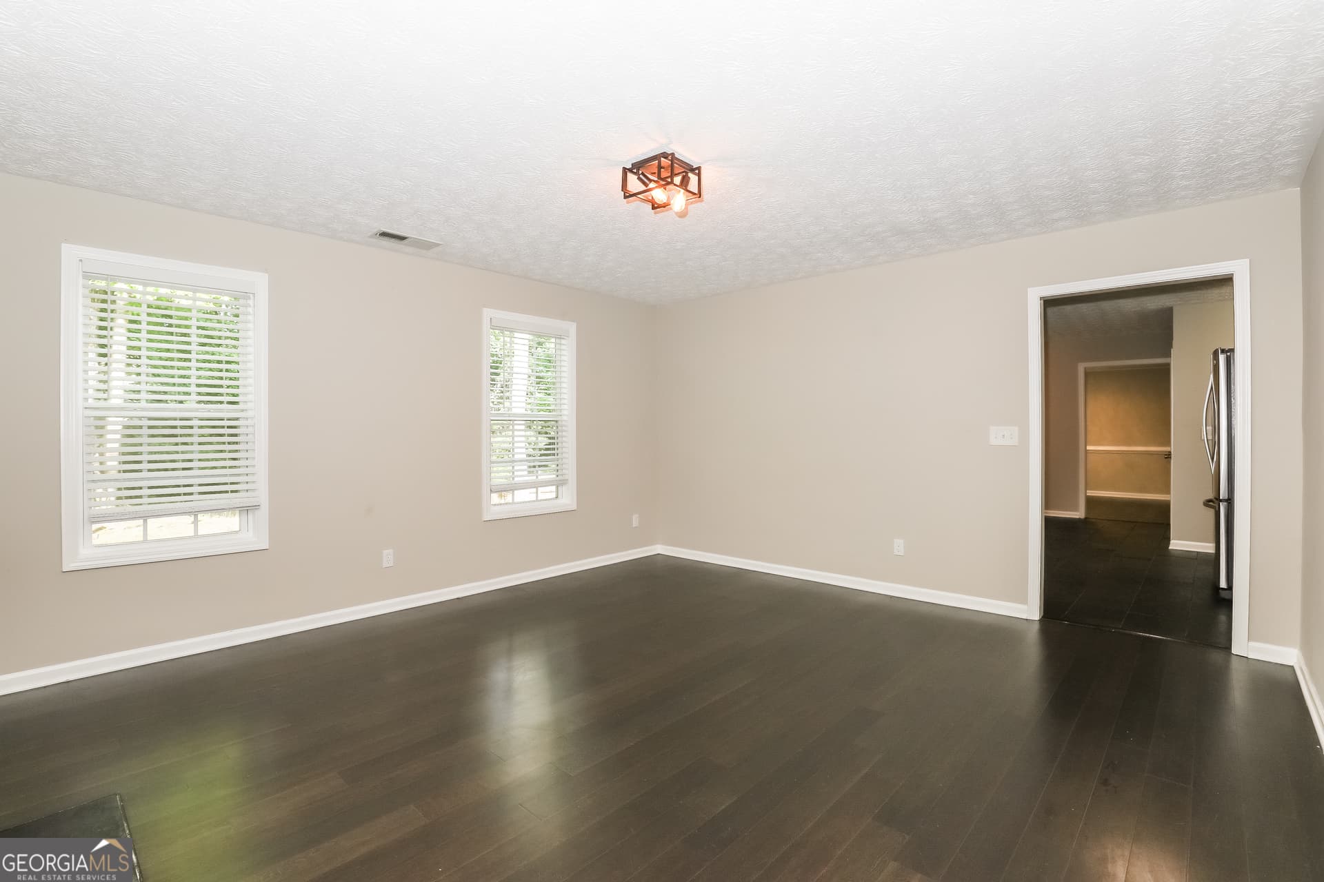4 bedroom, 2.5 bathroom, 2,932 sq ft single family residence for sale at 7895 Waterwheel Way, Jonesboro, GA 30238 — photo 3