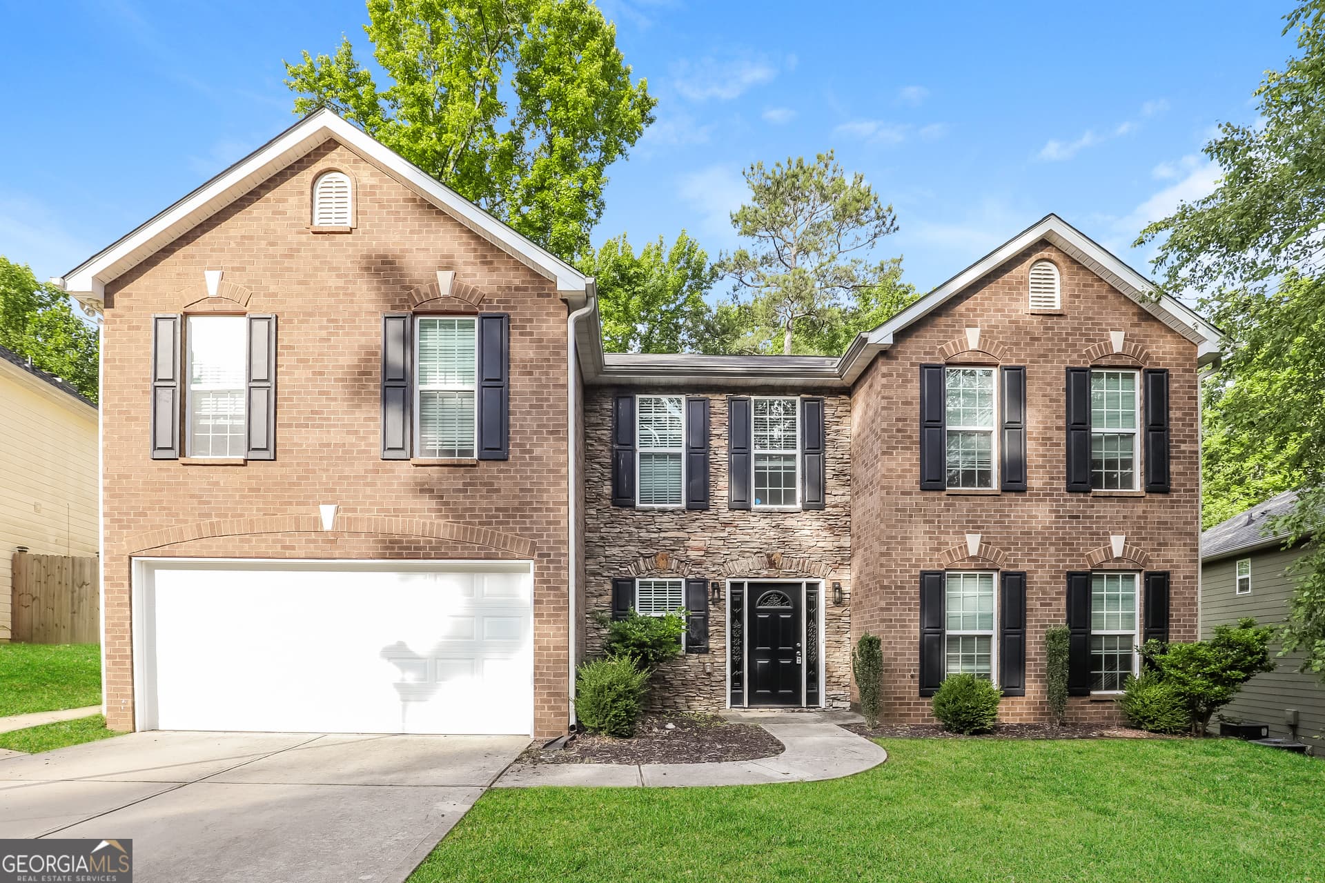 4 bedroom, 2.5 bathroom, 2,932 sq ft single family residence for sale at 7895 Waterwheel Way, Jonesboro, GA 30238 — photo 1 of 22