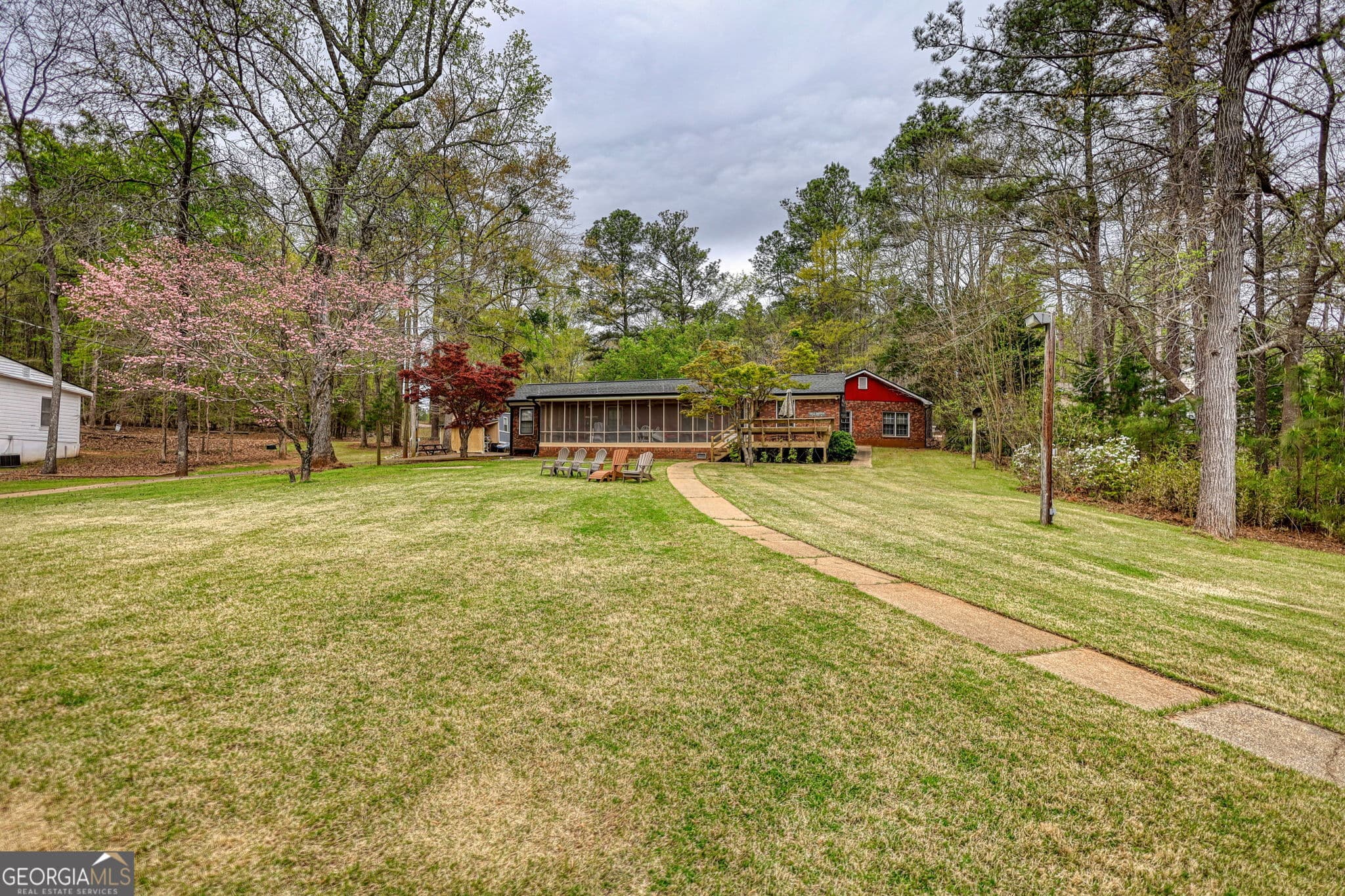 4 bedroom, 3 bathroom, 2,060 sq ft single family residence for sale at 1665 County Line Extension, Mansfield, GA 30055 — photo 2