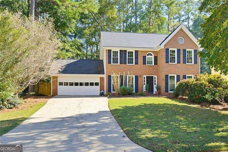 4 bedroom, 2.5 bathroom, 2,152 sq ft single family residence for sale at 5214 Michaels Way, Woodstock, GA 30188 — photo 2