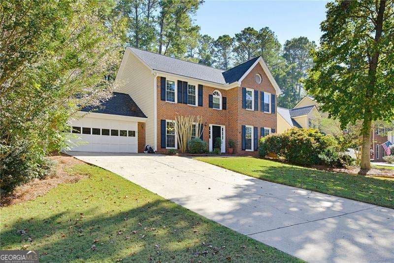 4 bedroom, 2.5 bathroom, 2,152 sq ft single family residence for sale at 5214 Michaels Way, Woodstock, GA 30188 — photo 3