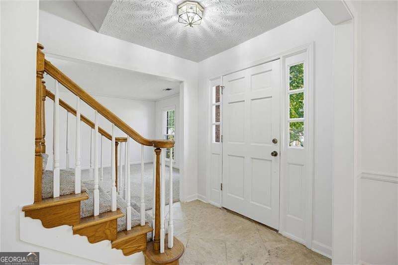 4 bedroom, 2.5 bathroom, 2,152 sq ft single family residence for sale at 5214 Michaels Way, Woodstock, GA 30188 — photo 5