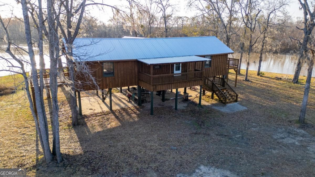 2 bedroom, 2 bathroom, 1,600 sq ft cabin,single family residence under contract at 6 Three Rivers Estates Road, Uvalda, GA 30473 — photo 3
