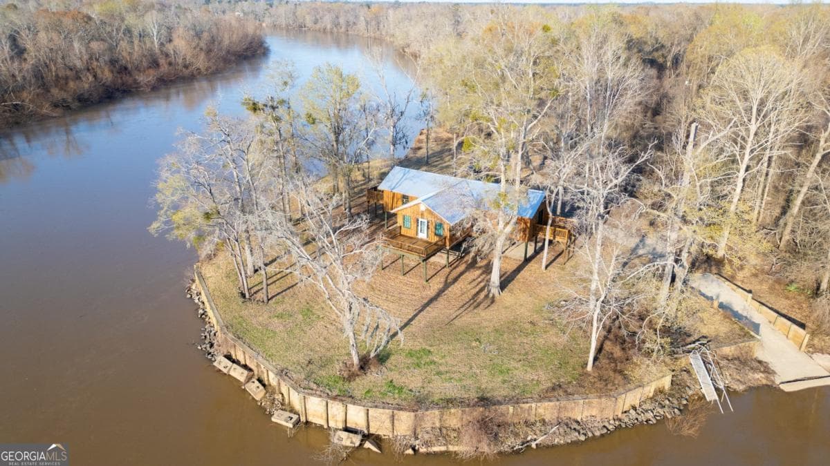 2 bedroom, 2 bathroom, 1,600 sq ft cabin,single family residence under contract at 6 Three Rivers Estates Road, Uvalda, GA 30473
