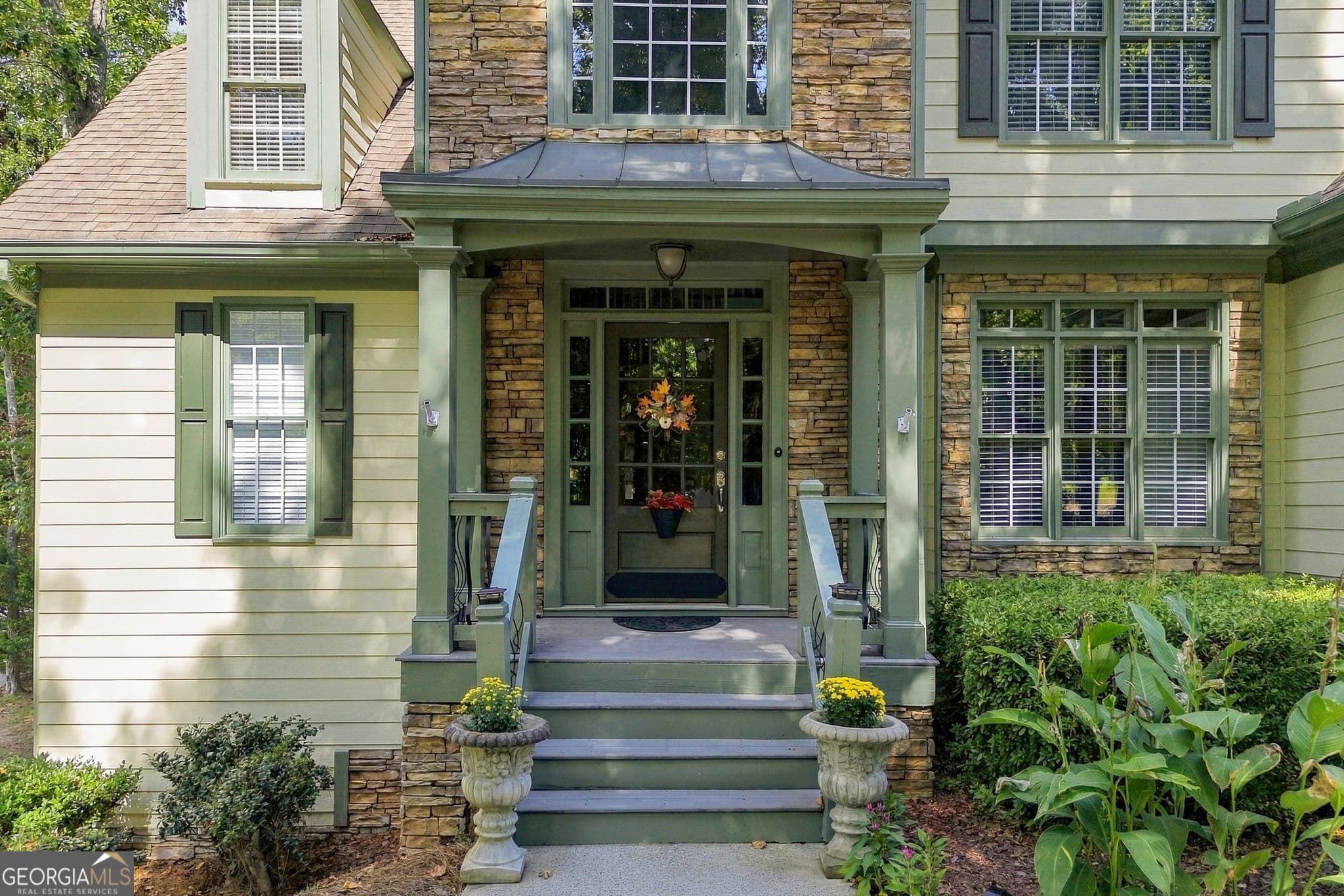6 bedroom, 4 bathroom, 4,205 sq ft single family residence for sale at 7930 Willow Point, Gainesville, GA 30506 — photo 3