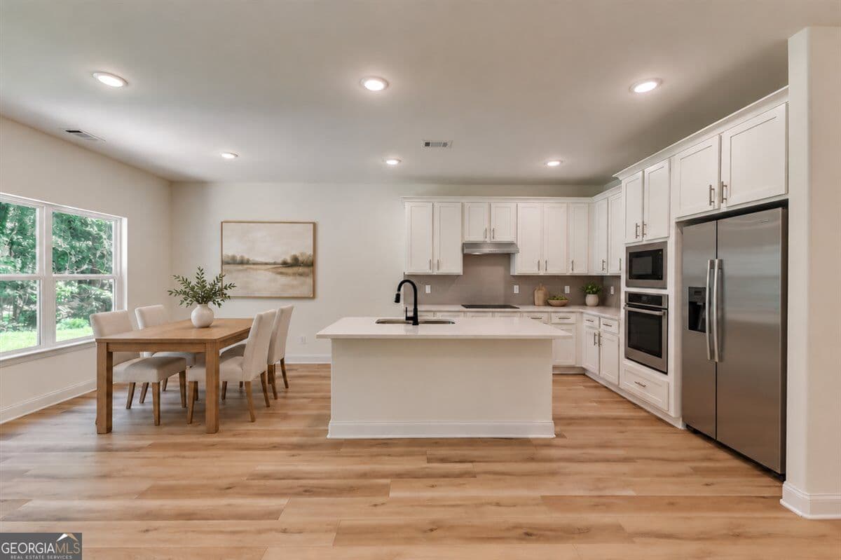 3 bedroom, 2.5 bathroom, 1,966 sq ft single family residence for sale at 427 Windy Lane, Jonesboro, GA 30238 — photo 9
