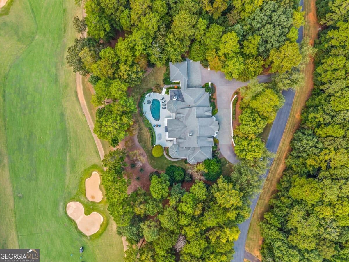 4 bedroom, 5.5 bathroom, 8,214 sq ft single family residence for sale at 1010 Callahans Ridge, Greensboro, GA 30642 — photo 6