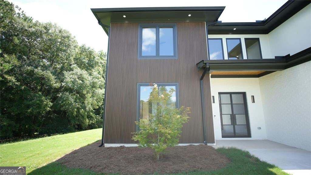 4 bedroom, 4.5 bathroom, 4,712 sq ft single family residence for sale at 3295 Kelly Glen Court, Dacula, GA 30019 — photo 4