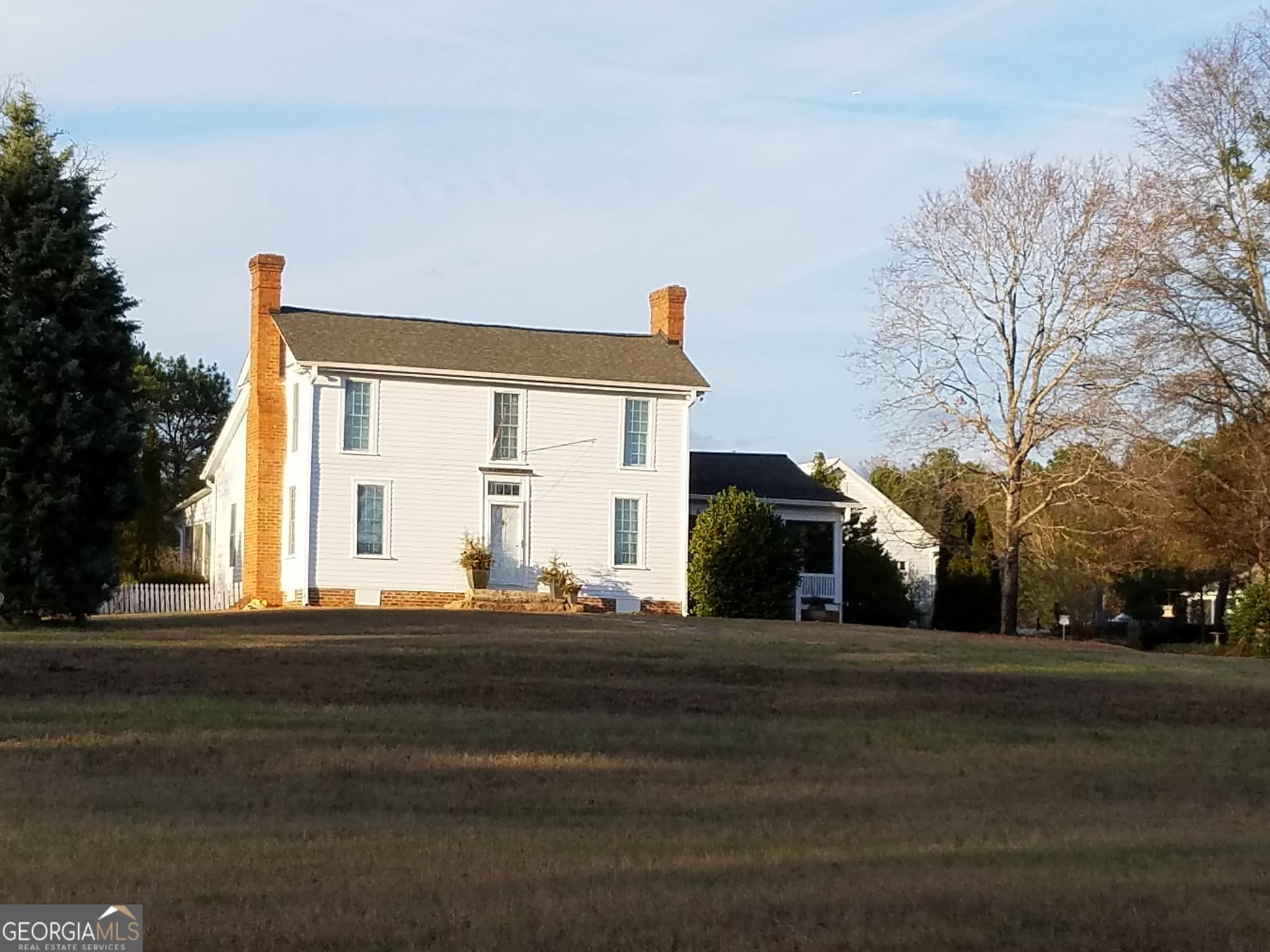 4 bedroom, 2.5 bathroom, 2,662 sq ft single family residence for sale at 1834 Highway 16, Jackson, GA 30233 — photo 2