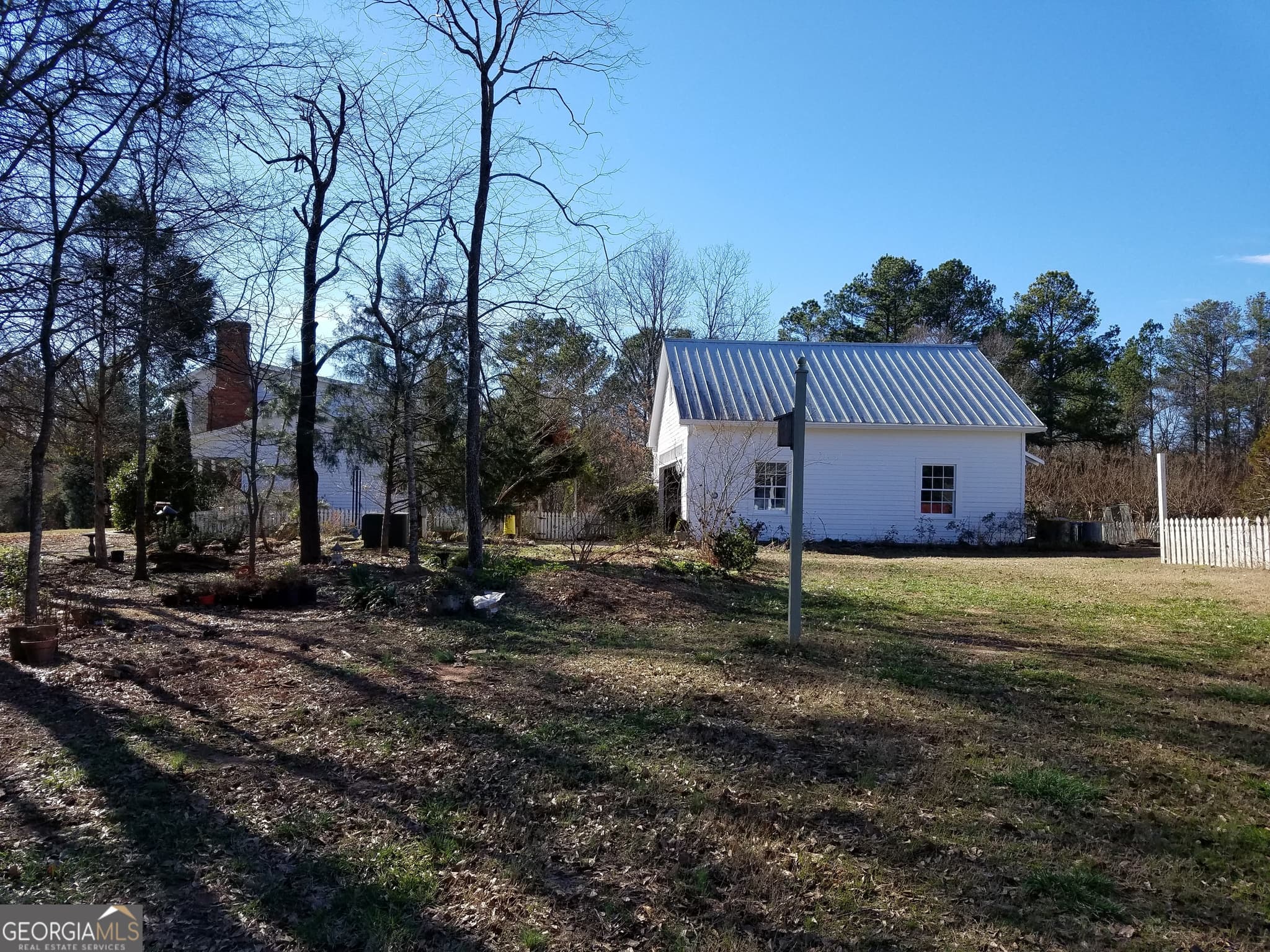 4 bedroom, 2.5 bathroom, 2,662 sq ft single family residence for sale at 1834 Highway 16, Jackson, GA 30233 — photo 4