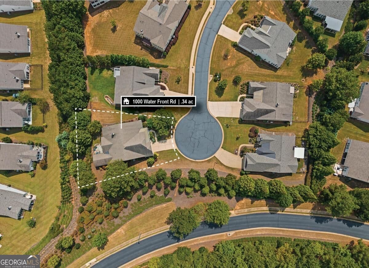 3 bedroom, 3.5 bathroom, 2,900 sq ft single family residence for sale at 1000 Water Front Road, Greensboro, GA 30642 — photo 2