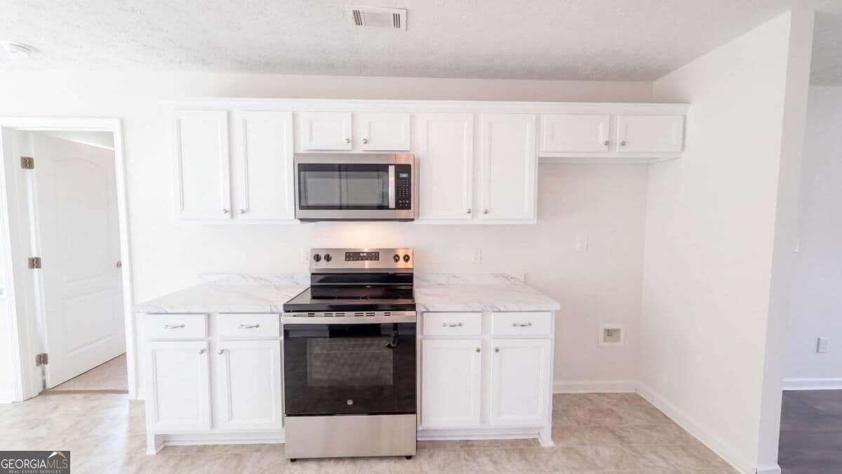 3 bedroom, 2 bathroom, 1,573 sq ft single family residence for sale at 114 Beaty Court, Flovilla, GA 30216 — photo 6