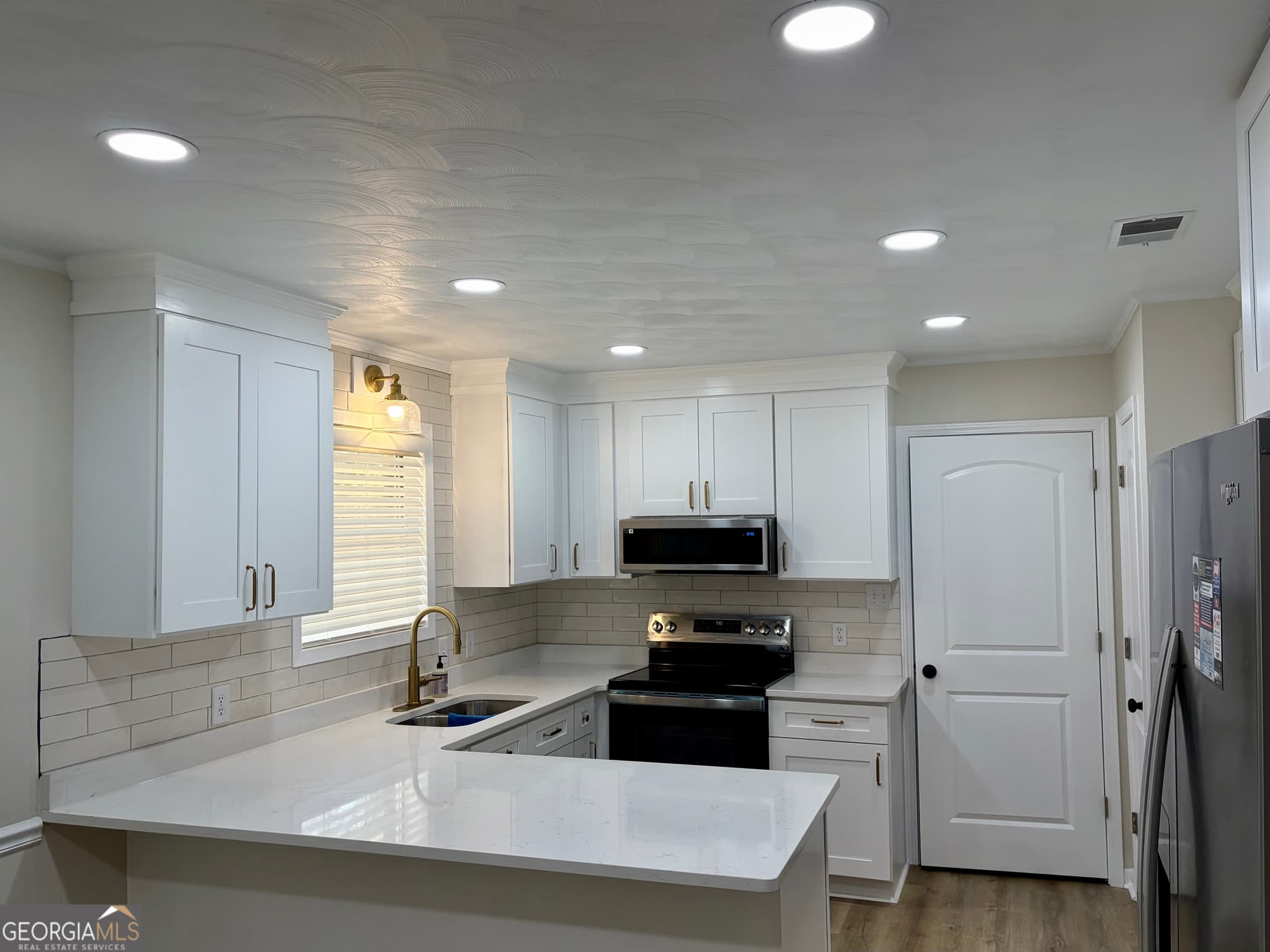 4 bedroom, 2 bathroom, 1,631 sq ft single family residence for sale at 72 W Tenth Street, Mcrae-Helena, GA 31037 — photo 6