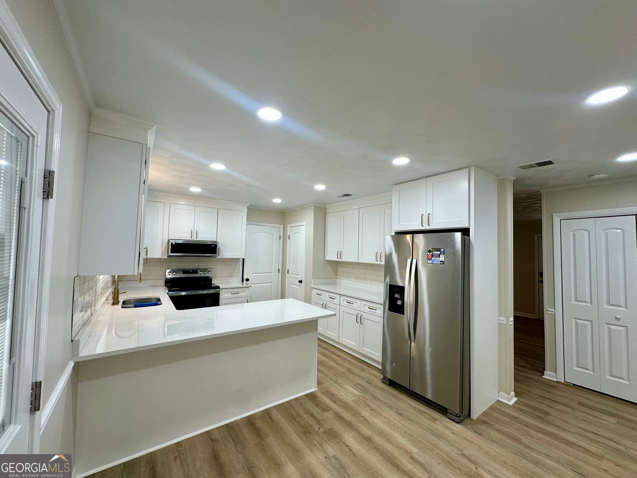 4 bedroom, 2 bathroom, 1,631 sq ft single family residence for sale at 72 W Tenth Street, Mcrae-Helena, GA 31037 — photo 5