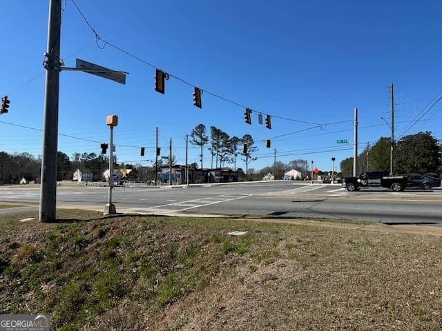 unimproved land for sale at 11822 Ga Hwy 92, Woodstock, GA 30188 — photo 1 of 5