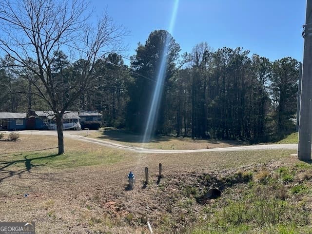 unimproved land for sale at 11822 Ga Hwy 92, Woodstock, GA 30188 — photo 4